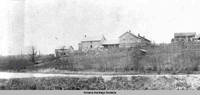 View of pharmacy and doctor residence backyard, Middle Amana, Iowa, 1900s