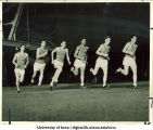 Athletes running quarter-mile race, The University of Iowa, March 3, 1922