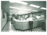 Checking out materials from the Reserve Book Room in the Main Library, the University of Iowa, April 1970
