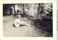 Vidie Burden sitting with unknown man in background