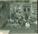 School children weaving in class, The University of Iowa elementary school, 1920s