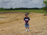 2007 Jack Strawhacker's grandson, Trenton plays by pond site