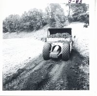 Building earth dam on William Wise farm, 1968