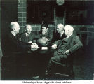 Men discussing football in radio broadcast, The University of Iowa, 1930s