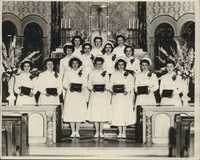 Class of 1949 with diplomas in the Cathedral.