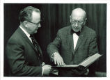 Library director Leslie W. Dunlap (left) with David C. Mearns of Library of Congress, The University of Iowa, April 24. 1969