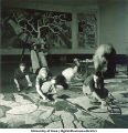Students painting modern art wall hangings, The University of Iowa, March 4, 1940