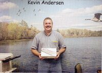 Staff holding doughnuts