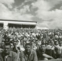 Students watching the Homecoming football game, 1954