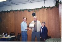 2001 Holly and Kay Wagner hold award as Cooperator of the Year winners.