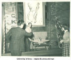 Decorating for a Hick Hawks dance party, The University of Iowa, 1940s