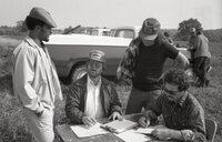 William Baugh talks with others on agricultural tour