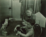 Gertrude E. Chittenden working with boy for thesis research, The University of Iowa, June 1, 1941