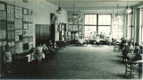 Students with exhibits for school open house, The University of Iowa, June 1926
