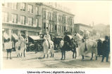 Costumed men on horses in parade, The University of Iowa, 1910s