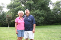 Unidentified couple with windbreak background