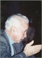 Earl O Heady in profile, gesturing with his right hand