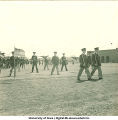 Soldiers marching near football stadium, The University of Iowa, 1950s