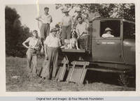 Geroge in truck with people