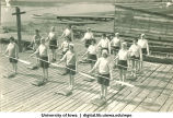 Land drill demonstrating rest paddles, The University of Iowa, 1930s