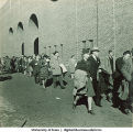 Football game attendees outside Kinnick Stadium, The University of Iowa, 1940s