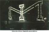 Homecoming arch made from the letters M and I on Washington Street, The University of Iowa, 1926