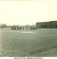 ROTC Scottish Highlanders outside football stadium, The University of Iowa, 1950s