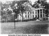 Cadets in line at Macbride Hall for barracks assignment, The University of Iowa, 1918