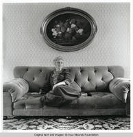 Elizabeth sitting on sofa