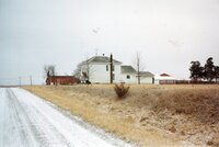 Two views of Bill Moore's house before a windbreak was established