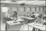 Professor lecturing in classroom, 1978