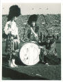 Members of the Scottish Highlanders on football field with drum, The University of Iowa, October 26, 1948