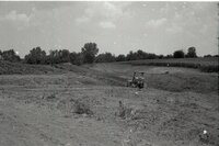 1970s Earthmoving machinery in field