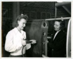 Two cadettes practice using  a pneumatic riveter , 1943