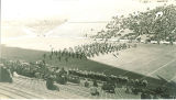 Marching band performance at football game, The University of Iowa, October 1938