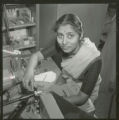 Female Indian graduate student in the soils laboratory, 1962
