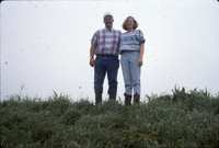 Linda and Dana Sitzmann pose in the newly constructed terrace in the field.