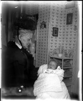 UP488 Woman in hat and veil with baby