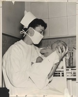 Nurse, baby and mother.