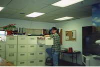 2000  Coop employee Chris Hogge works in the office