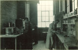Men working in a laboratory, The University of Iowa, 1930s