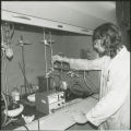 Researcher performing experiment, 1978