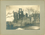 Men looking at the smoke and ruins of Medical Building after the fire, the University of Iowa, March 10, 1901