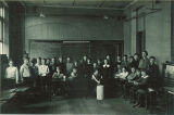 School children making butter, The University of Iowa, March 1925