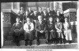 Group of Geology professors and assistants in front of Old Science Hall, The University of Iowa, 1900s