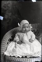Infant in bonnet
