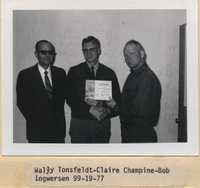 Wally Tonsfeldt, Claire Champine, and Bob Ingwersen Pose with the Iowa Soil Achievement Award.