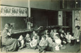 Teacher reading to class, The University of Iowa elementary school, 1920s