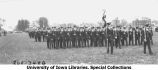 Governor's Day ceremony, cadets marching for pass and review, The University of Iowa, 1931