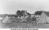 Cadets setting up tents, The University of Iowa, 1912